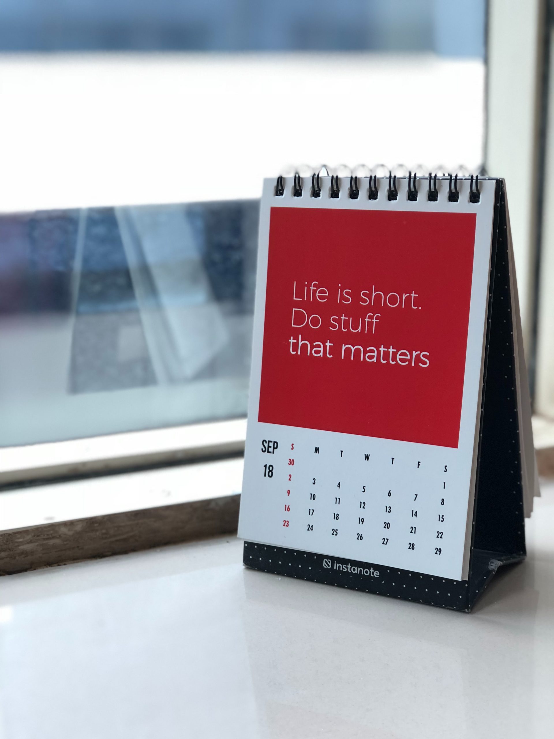 Red and white calendar with the message "life is short, do stuff that matters"